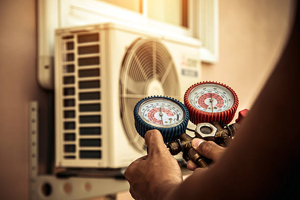 Professional Air Conditioning Service technician working in Mc David, FL